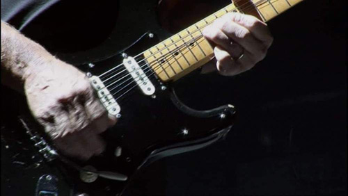 David Gilmour performing an extreme 
            bend on several strings