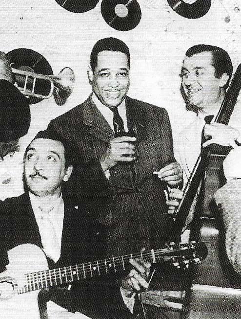 Duke Ellington (center), pictured in 1939, had a big hit in the 1930s with 'It  Don't Mean a Thing (If It Ain't Got That Swing)'. It was probably the first song title to reference the music style.