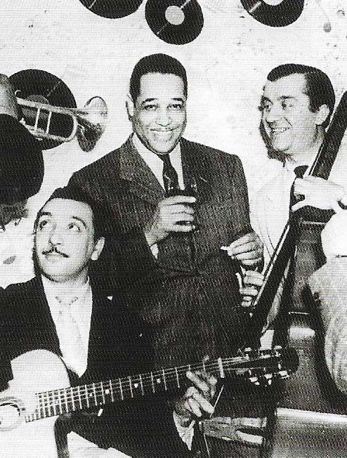 Duke Ellington (center), pictured in 1939, had a big hit in the 1930s with 'It Don't Mean a Thing (If It Ain't Got That Swing)'. It was probably the first song title to reference the music style.